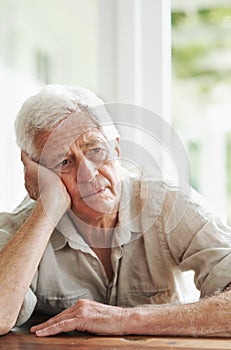 Senior man, lonely and thinking of depression, anxiety and stress of mental health, grief and problems. Depressed, sad