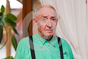 Senior man looking directly at the camera