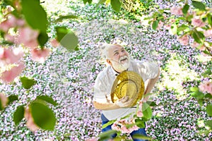 Senior man looking up. good memories of past. Human emotions and expressions. Very old man portrait. thinking about