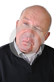 Senior man making faces