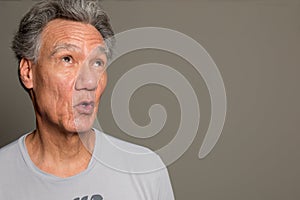 Senior Man making faces