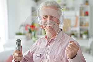 Senior man with microphone