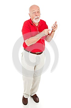 Senior Man with MP3 Player - Full Body photo