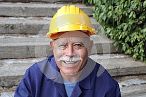 Senior man with a mustache doing construction work