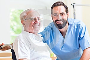 Senior man and nurse in rest home