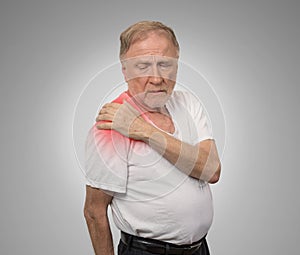 Senior man with pain in his shoulder