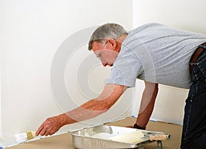 Senior man painting