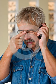 Senior man with phone