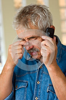 Senior man with phone