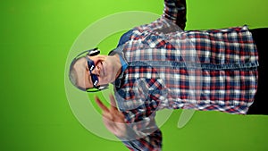 Senior man in pixelated sunglasses thug life meme style, dances energetically.
