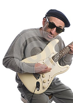 Senior man playing guitar