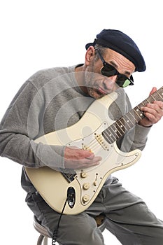 Senior man playing guitar