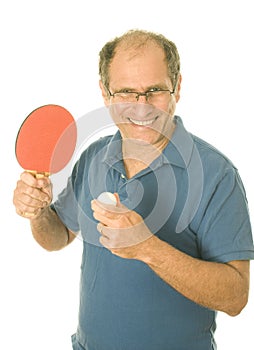 Senior man playing ping-pong table tennis