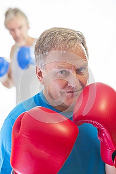 Senior man posing in boxing stance