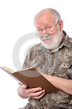 Senior man reading a book, isolated on white