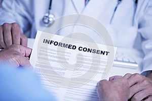 Senior man reading an informed consent