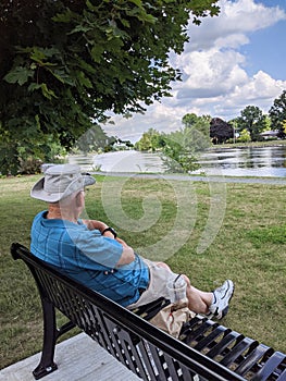 Senior Man Relaxing by the River