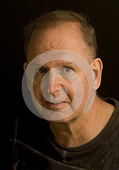 Senior man retired head shot portrait in tee shirt