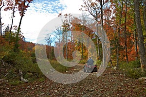 Senior man riding an ATV quad