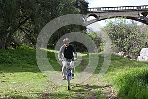 Senior Man Riding a Bike