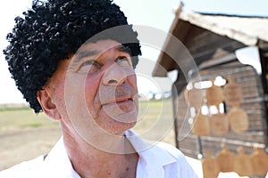 Senior man in Russian Karakul Kubanka Cossack Hat