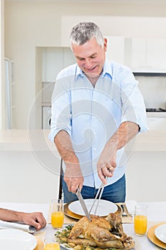 Senior man serving food