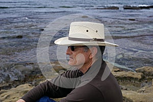 Senior Man Sitting Alone Thinking or Meditating