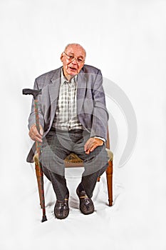 Senior man sitting in his armchair