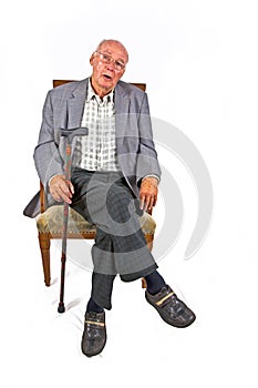 senior man sitting in his armchair
