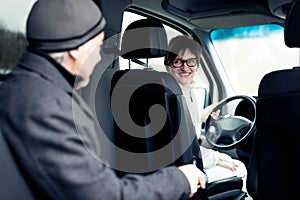 Senior Man Sitting In Paratransit Van