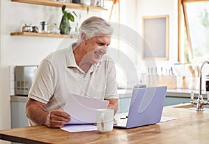 Senior man, smile and laptop working in kitchen getting good news about income, investments or insurance at home. Happy