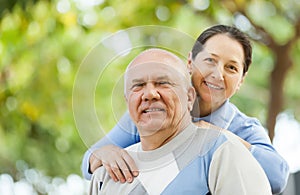 Senior man and smiling mature woman