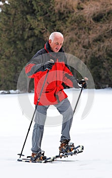 Senior Man Snowshoeing