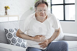 Senior man with stomach pain