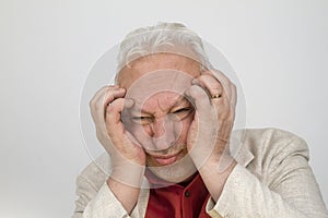 Senior man with strong headache