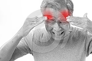 Senior man suffering from headache, stress, migraine