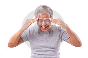 Senior man suffering from headache, stress, migraine