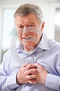 Senior Man Suffering Heart Attack At Home