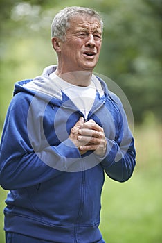 Senior Man Suffering Heart Attack Whilst Jogging