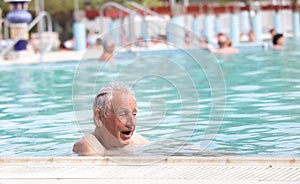 Senior man in swimming pool