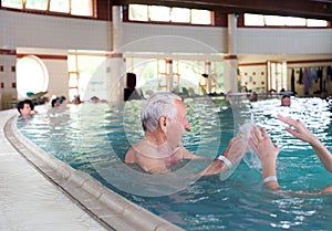 Senior man in swimming pool