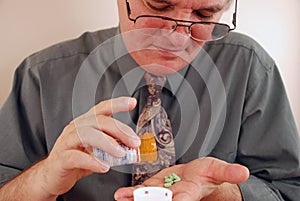 Senior Man Taking Medication