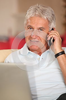 Senior man with telephone