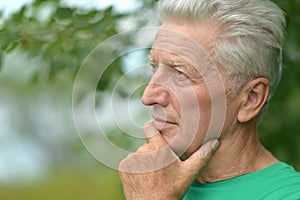 Senior man thinking outddor