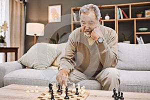 Senior man, thinking or playing chess in house, home living room or apartment in Japanese strategy, checkmate or board