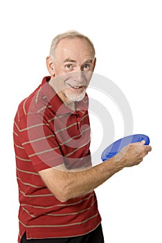 Senior man throwing frisbee on white background