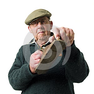 Senior man with tool