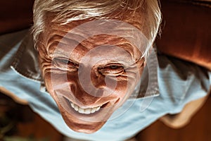 Senior man toothy laugh photo