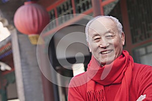 Senior Man in Traditional Chinese Courtyard