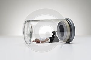 Senior man trapped in a glass jar